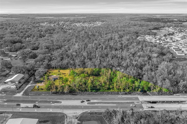 aerial view featuring a forest view