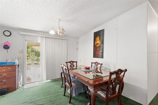 dining area with a textured ceiling, carpet flooring, and an inviting chandelier