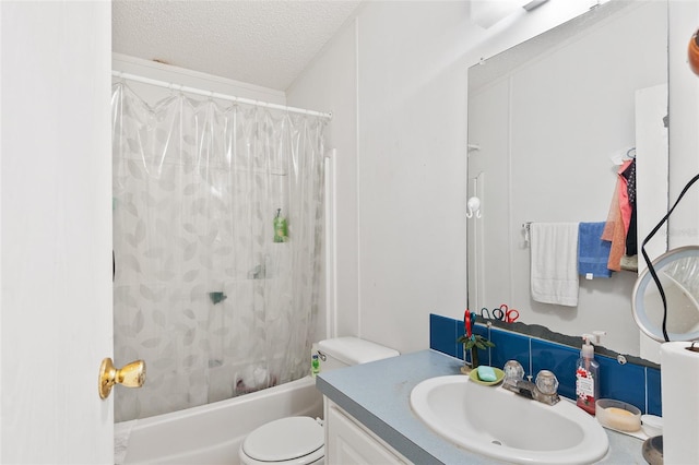 full bath featuring a textured ceiling, toilet, shower / bath combination with curtain, and vanity