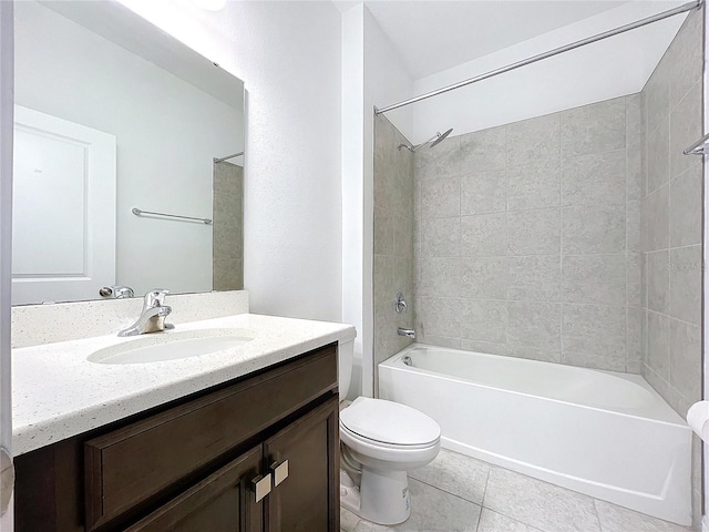 full bathroom featuring toilet, tile patterned floors, bathtub / shower combination, and vanity