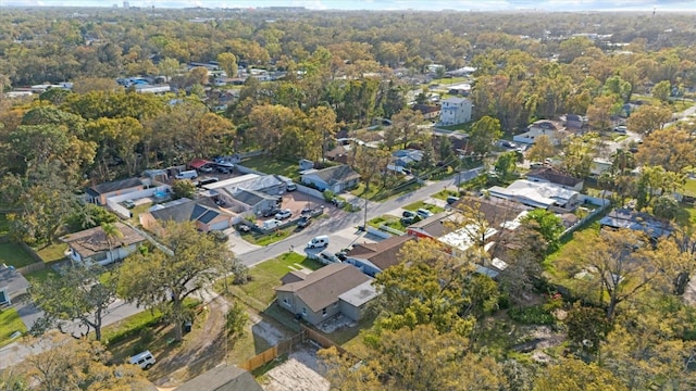 aerial view featuring a residential view and a view of trees