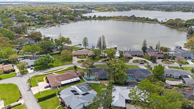 birds eye view of property featuring a residential view and a water view