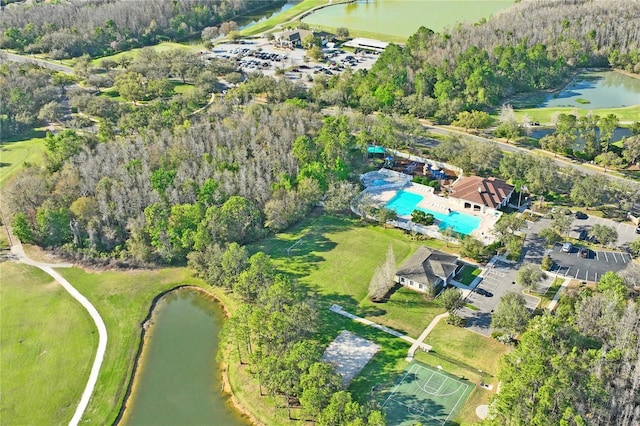 birds eye view of property featuring a water view