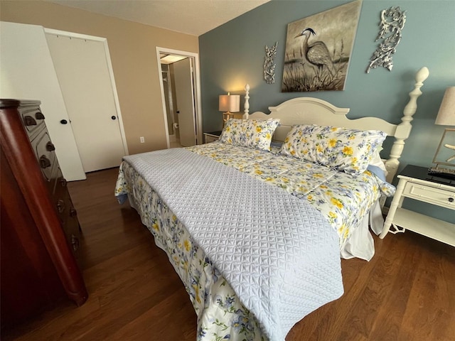 bedroom with wood finished floors