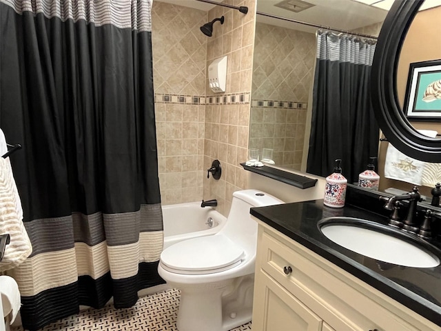 bathroom with toilet, shower / bath combo with shower curtain, and vanity