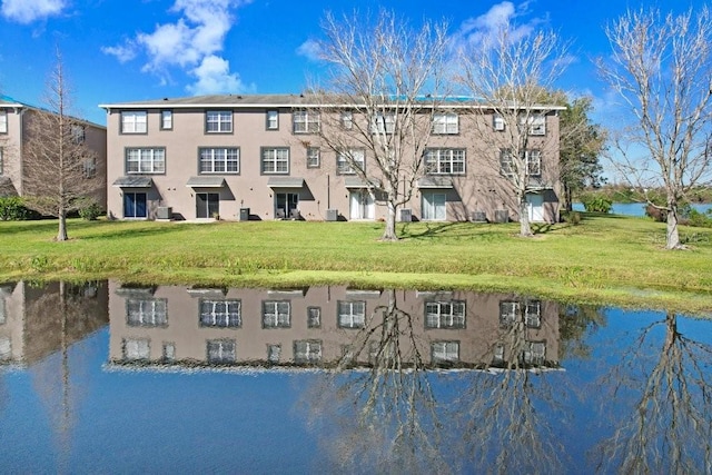 exterior space with a water view