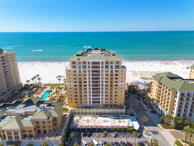 aerial view featuring a view of the beach and a water view