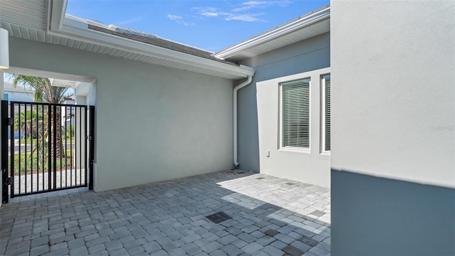 view of patio / terrace with a gate