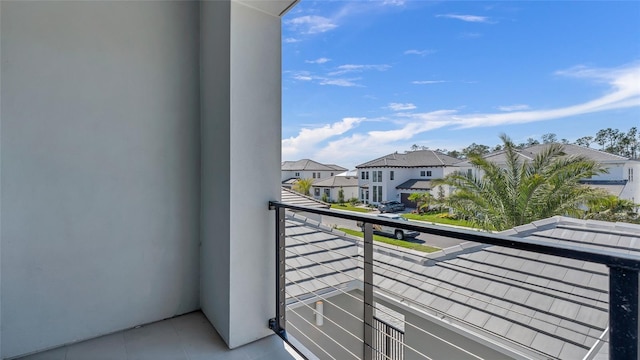 balcony featuring a residential view