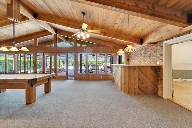 rec room featuring lofted ceiling with beams, wooden ceiling, and carpet