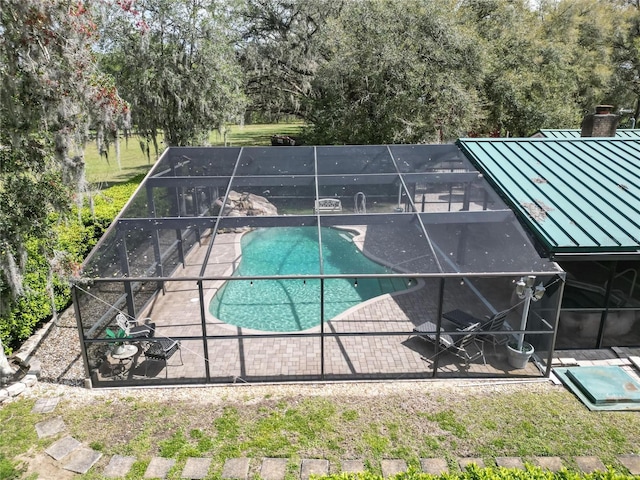 exterior space featuring a lanai and a patio area