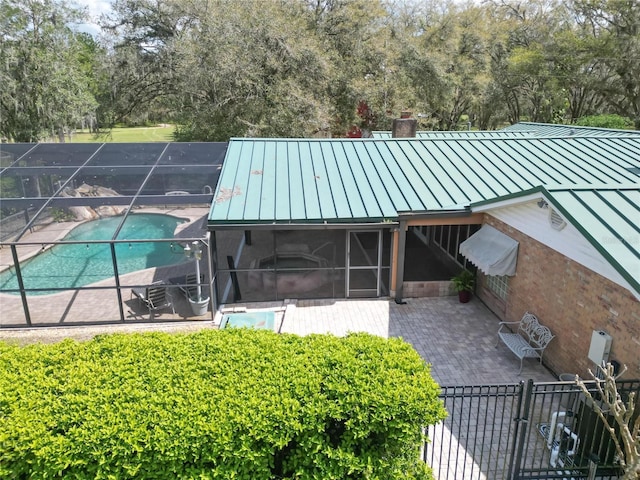 exterior space featuring a fenced in pool and fence