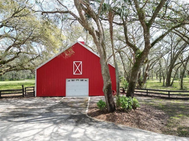 detached garage with fence