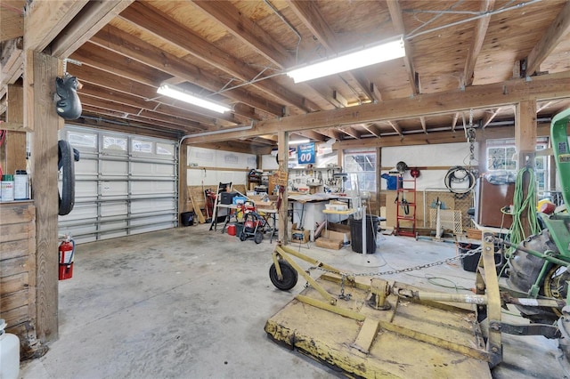 garage with a workshop area