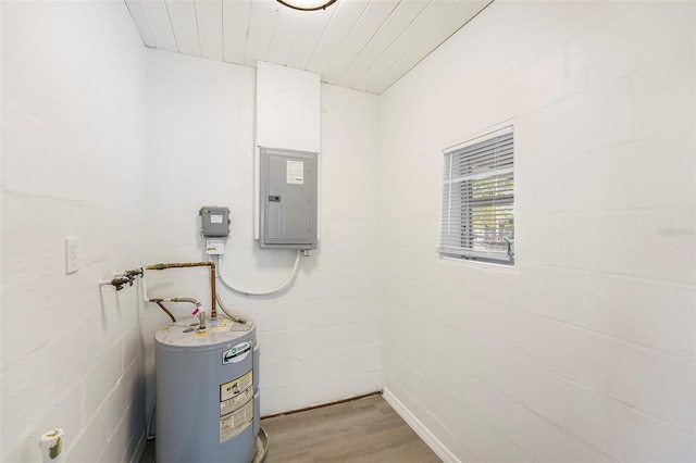 679 71st Ave N, Saint Petersburg, FL 33702 - utility room featuring electric panel and water heater