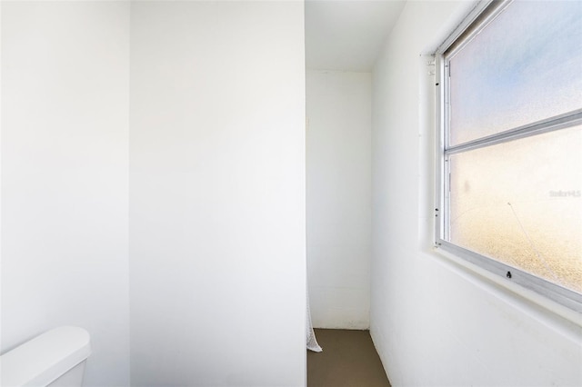 679 71st Ave N, Saint Petersburg, FL 33702 - bathroom with a wealth of natural light and toilet