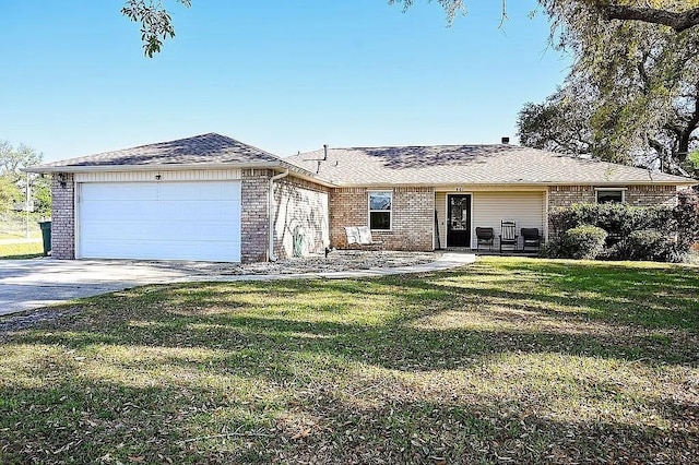 ranch-style house with an attached garage, brick siding, driveway, roof with shingles, and a front lawn