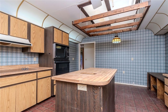 kitchen with brick floor, butcher block counters, baseboards, black appliances, and wallpapered walls