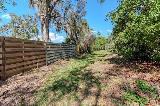 view of yard featuring a fenced backyard