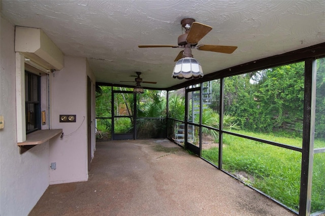 5101 Estates Cir, Sarasota, FL 34243 - unfurnished sunroom with a ceiling fan