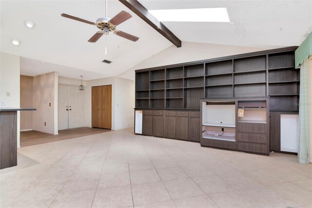 5101 Estates Cir, Sarasota, FL 34243 - unfurnished living room with a ceiling fan, recessed lighting, light tile patterned floors, and a skylight