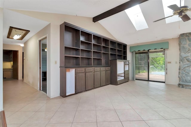 5101 Estates Cir, Sarasota, FL 34243 - unfurnished living room with a skylight, light tile patterned flooring, and ceiling fan
