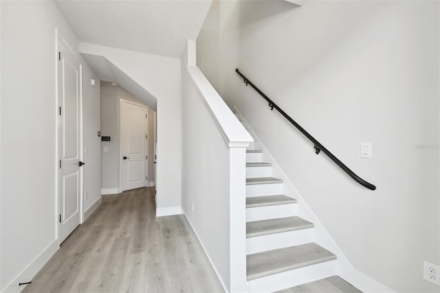 4717 W Mccoy St Unit 9, Tampa, FL 33616 - stairs with wood finished floors and baseboards