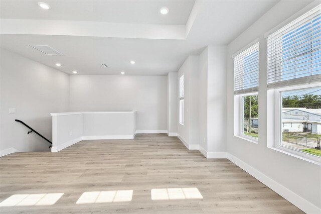 4717 W Mccoy St Unit 9, Tampa, FL 33616 - unfurnished room with light wood-type flooring, baseboards, and recessed lighting