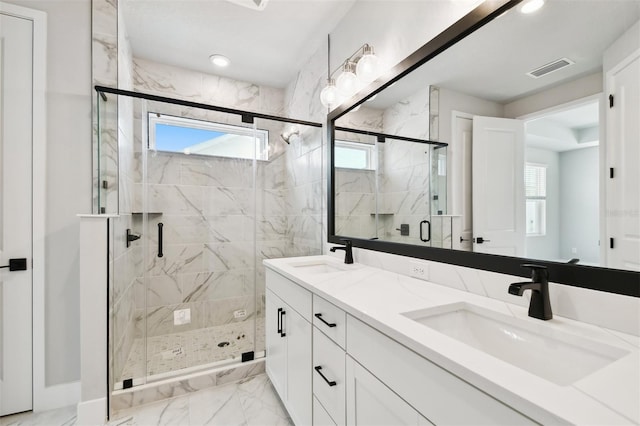 4717 W Mccoy St Unit 9, Tampa, FL 33616 - bathroom with marble finish flooring, a marble finish shower, and double vanity