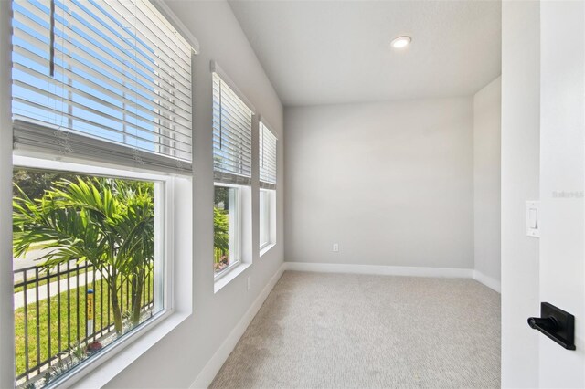 4717 W Mccoy St Unit 9, Tampa, FL 33616 - empty room with carpet, baseboards, and recessed lighting
