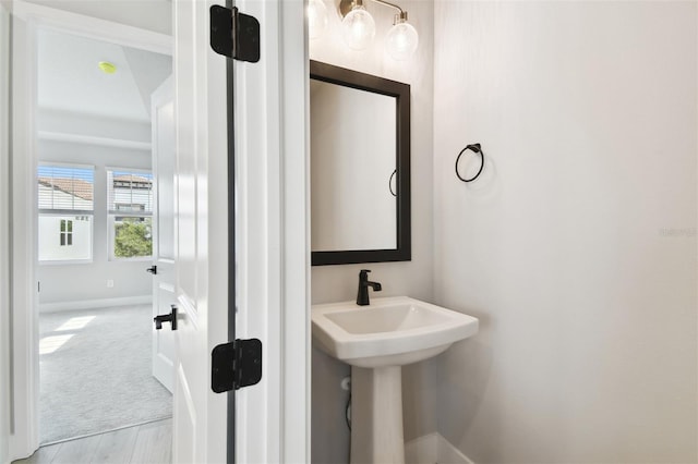 4717 W Mccoy St Unit 9, Tampa, FL 33616 - bathroom with baseboards