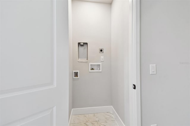 4717 W Mccoy St Unit 9, Tampa, FL 33616 - washroom with hookup for an electric dryer, light marble finish floors, hookup for a washing machine, and baseboards