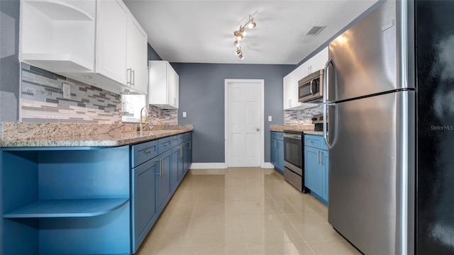 kitchen featuring open shelves, blue cabinets, visible vents, and stainless steel appliances