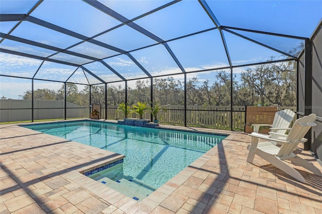 view of swimming pool with a fenced backyard, a fenced in pool, and a patio