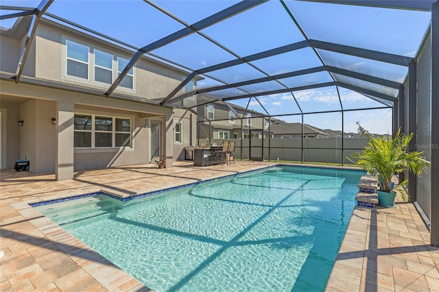 view of swimming pool with a patio area and a fenced in pool