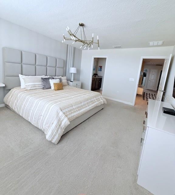 bedroom featuring baseboards, visible vents, light colored carpet, an inviting chandelier, and a textured ceiling