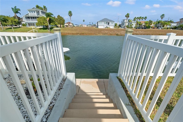 exterior space with a water view