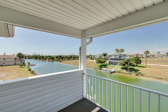 balcony featuring a water view