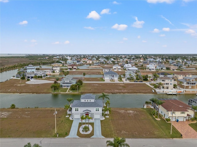 aerial view featuring a water view and a residential view