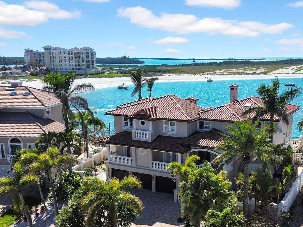940 Monte Cristo Blvd, Tierra Verde, FL 33715 - view from above of property with a nearby body of water