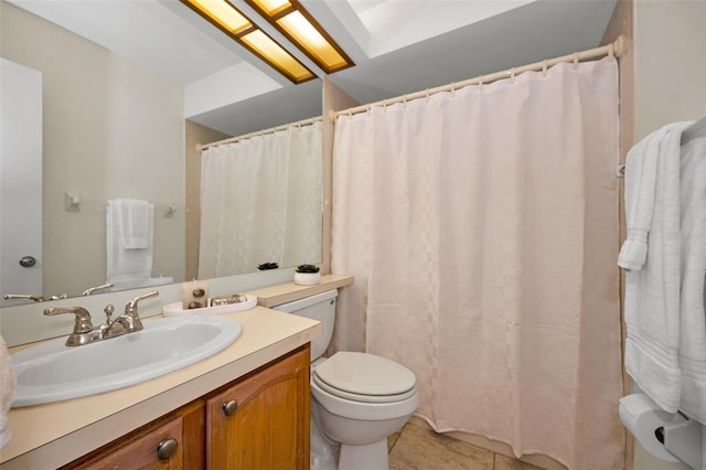 2446 Bentley Dr, Palm Harbor, FL 34684 - full bath featuring toilet, tile patterned floors, and vanity