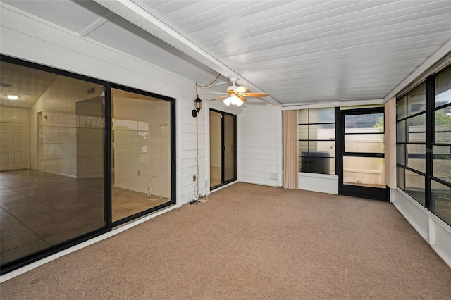 2446 Bentley Dr, Palm Harbor, FL 34684 - unfurnished sunroom featuring ceiling fan