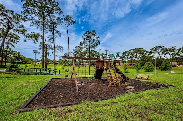 2446 Bentley Dr, Palm Harbor, FL 34684 - community jungle gym with a lawn