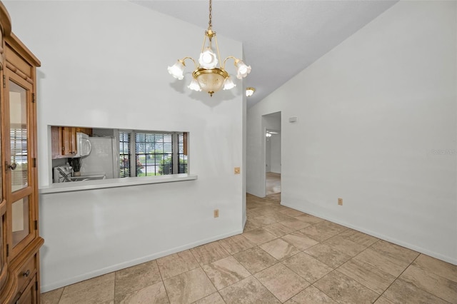 2446 Bentley Dr, Palm Harbor, FL 34684 - unfurnished dining area featuring baseboards, a notable chandelier, and high vaulted ceiling