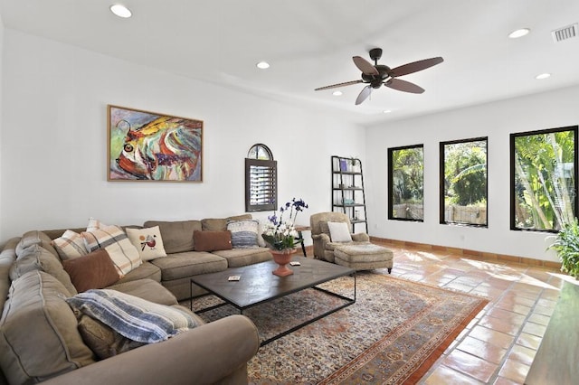 living area with recessed lighting, visible vents, ceiling fan, and baseboards