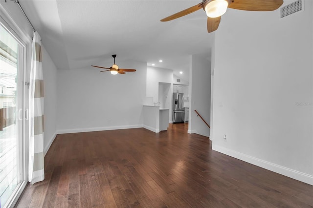 7 Georgia Ave, Crystal Beach, FL 34681 - unfurnished living room with visible vents, lofted ceiling, dark wood-type flooring, and a ceiling fan
