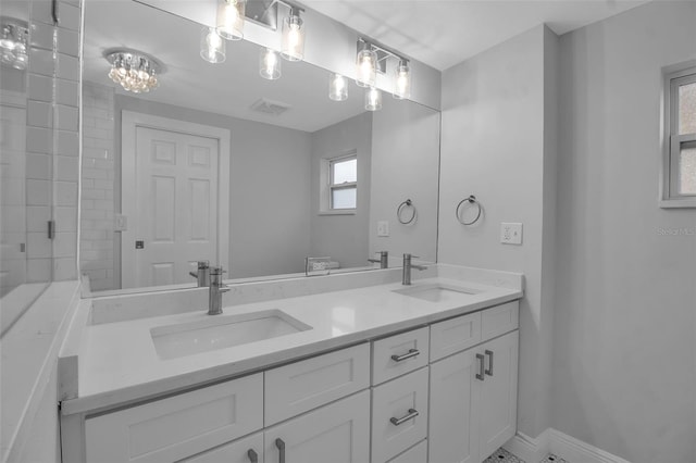 7 Georgia Ave, Crystal Beach, FL 34681 - full bathroom with a sink, visible vents, and double vanity