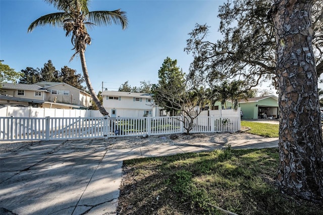 7 Georgia Ave, Crystal Beach, FL 34681 - view of front of home featuring a fenced front yard
