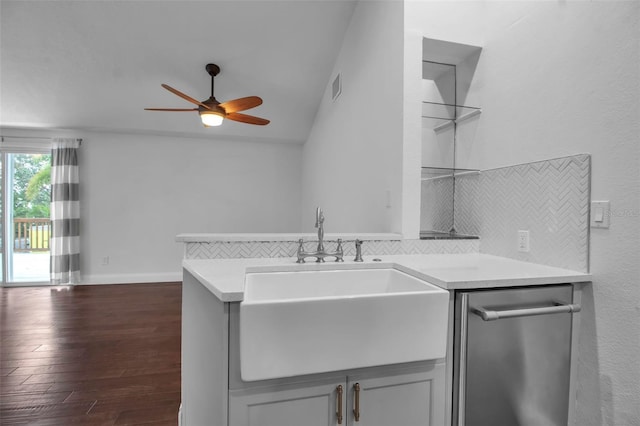 7 Georgia Ave, Crystal Beach, FL 34681 - kitchen with dark wood-style floors, ceiling fan, decorative backsplash, light countertops, and a sink