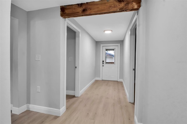 7 Georgia Ave, Crystal Beach, FL 34681 - hall with baseboards and light wood-style floors